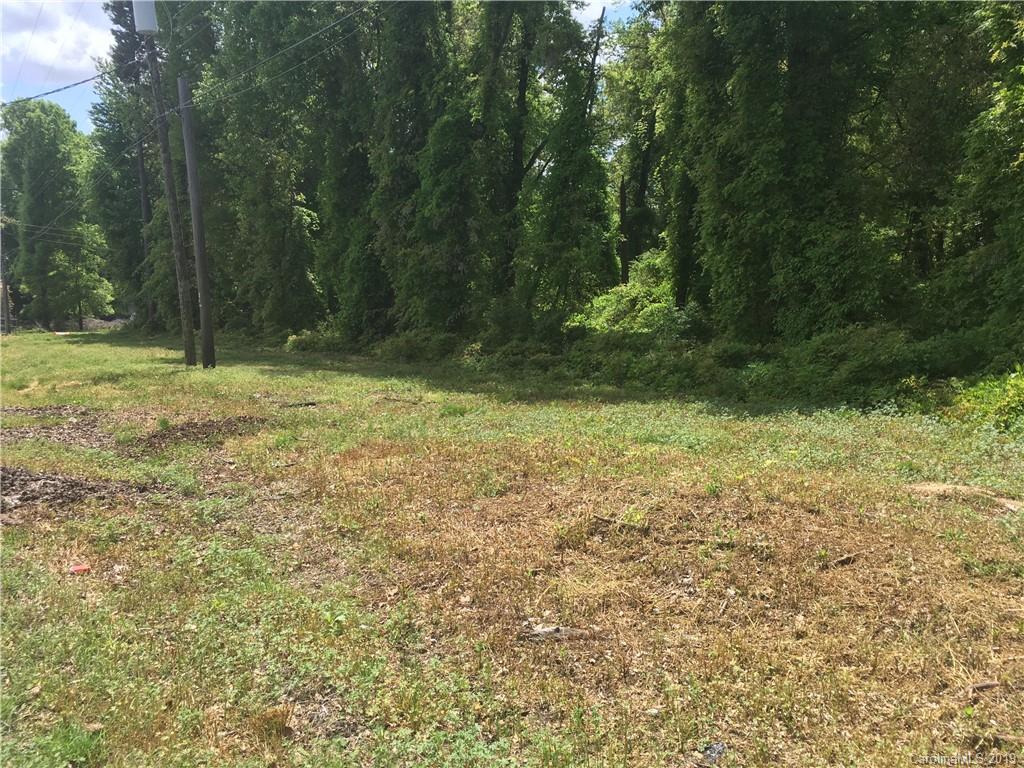 0 Wallace Road Charlotte, NC 28212 - Photo 3 of 7 a view of a yard with a tree