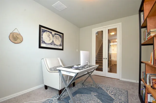 a room with a table and a window