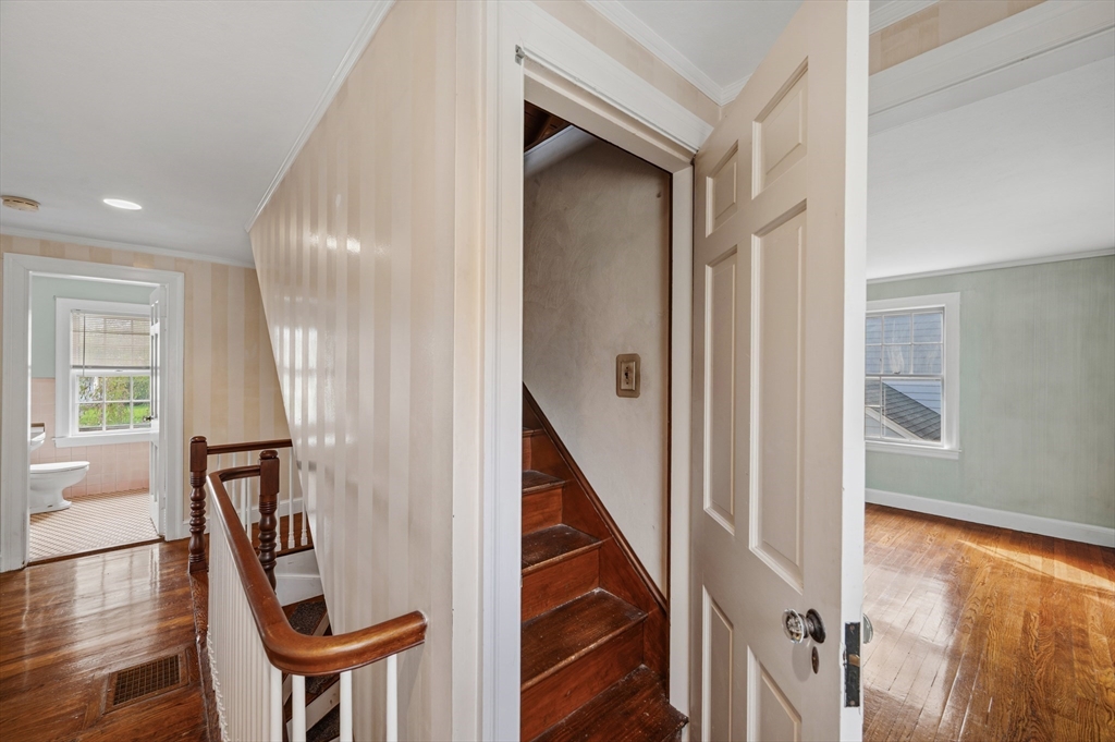 26 Pickwick Road Marblehead, MA 01945 - Photo 30 of 40 a view of an entryway with wooden floor and windows
