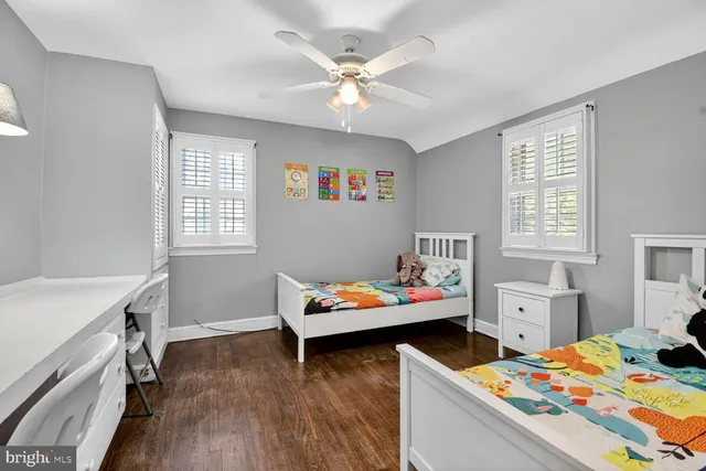 a very nice looking room with a bed and a window