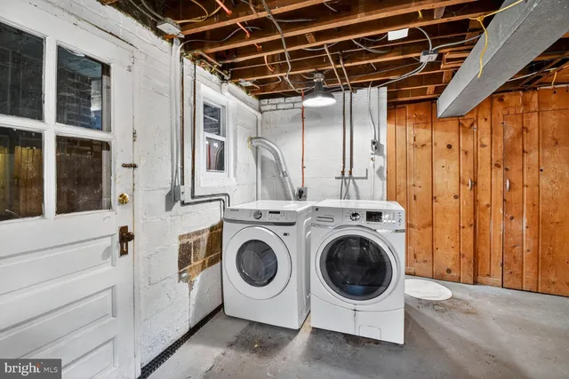 a view of a patio with table and chairs and potted plants