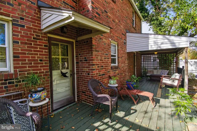 a view of yard with wooden fence