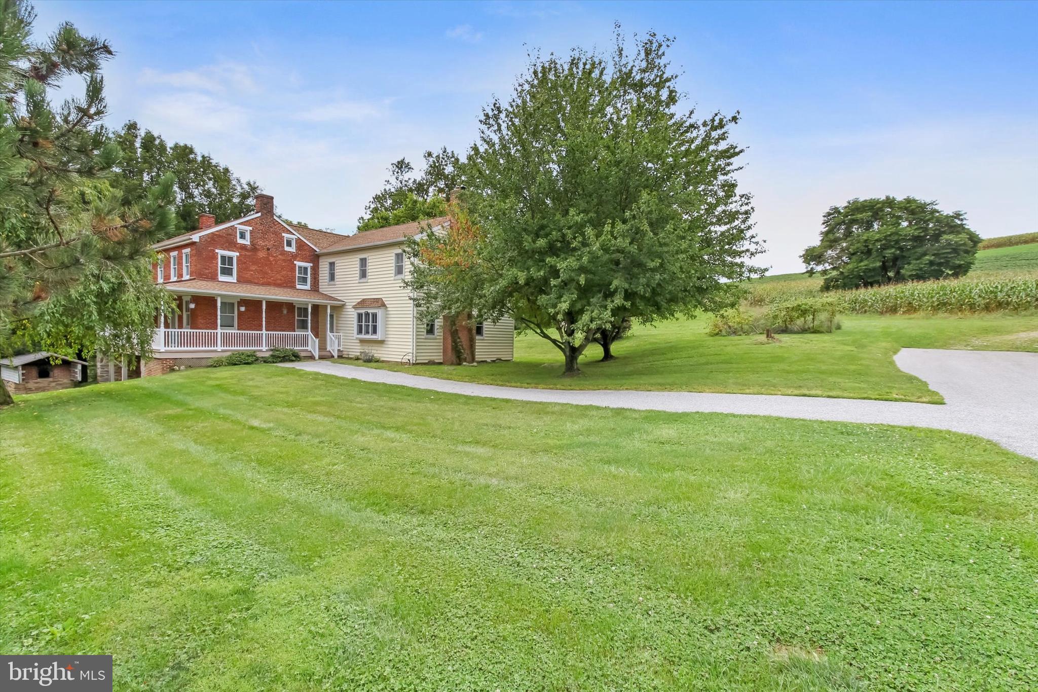 8219 Lehman Road Dallastown, PA 17313 - Photo 3 of 40 a front view of a house with a yard