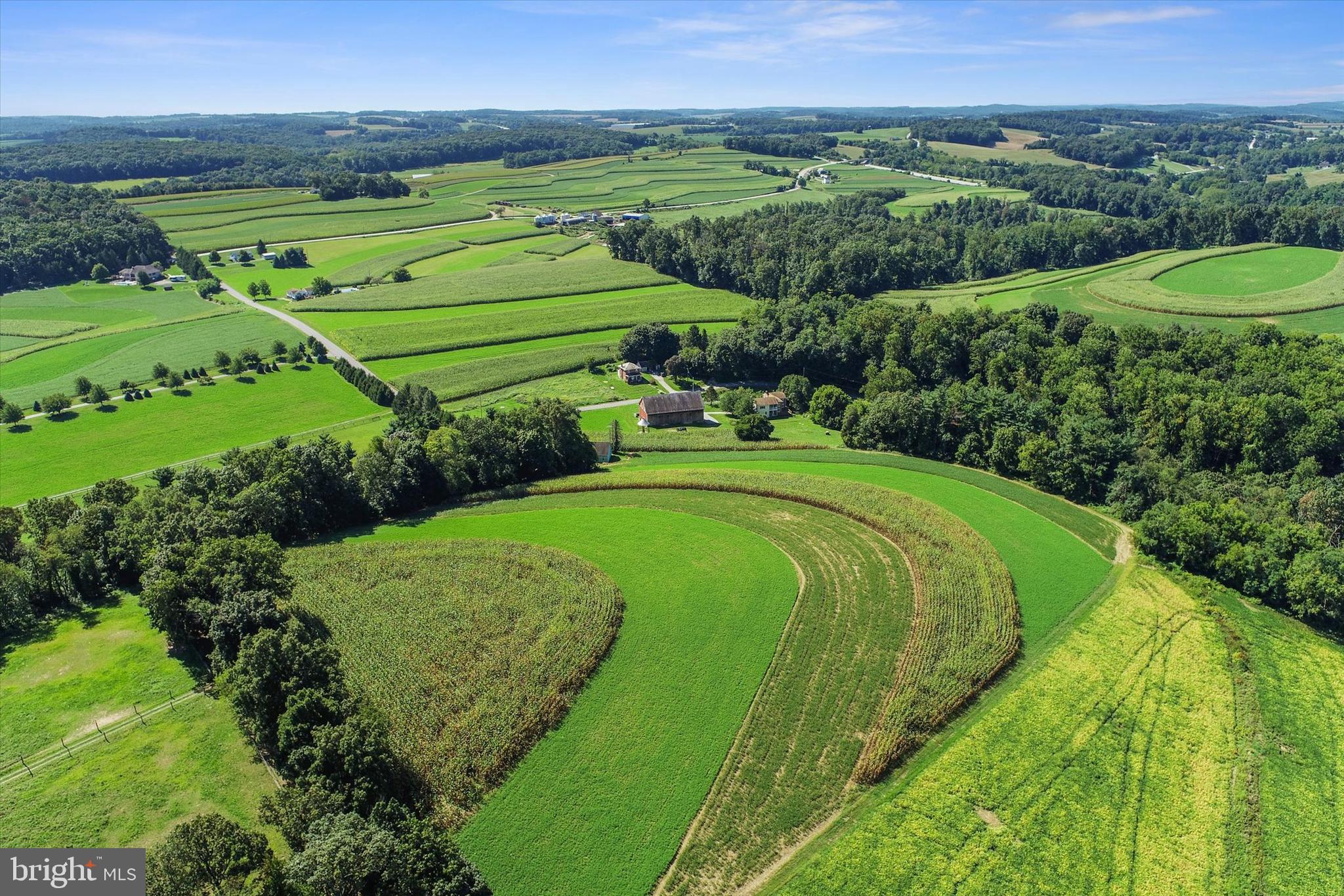 8219 Lehman Road Dallastown, PA 17313 - Photo 36 of 40 a view of a lush green field with clear sky