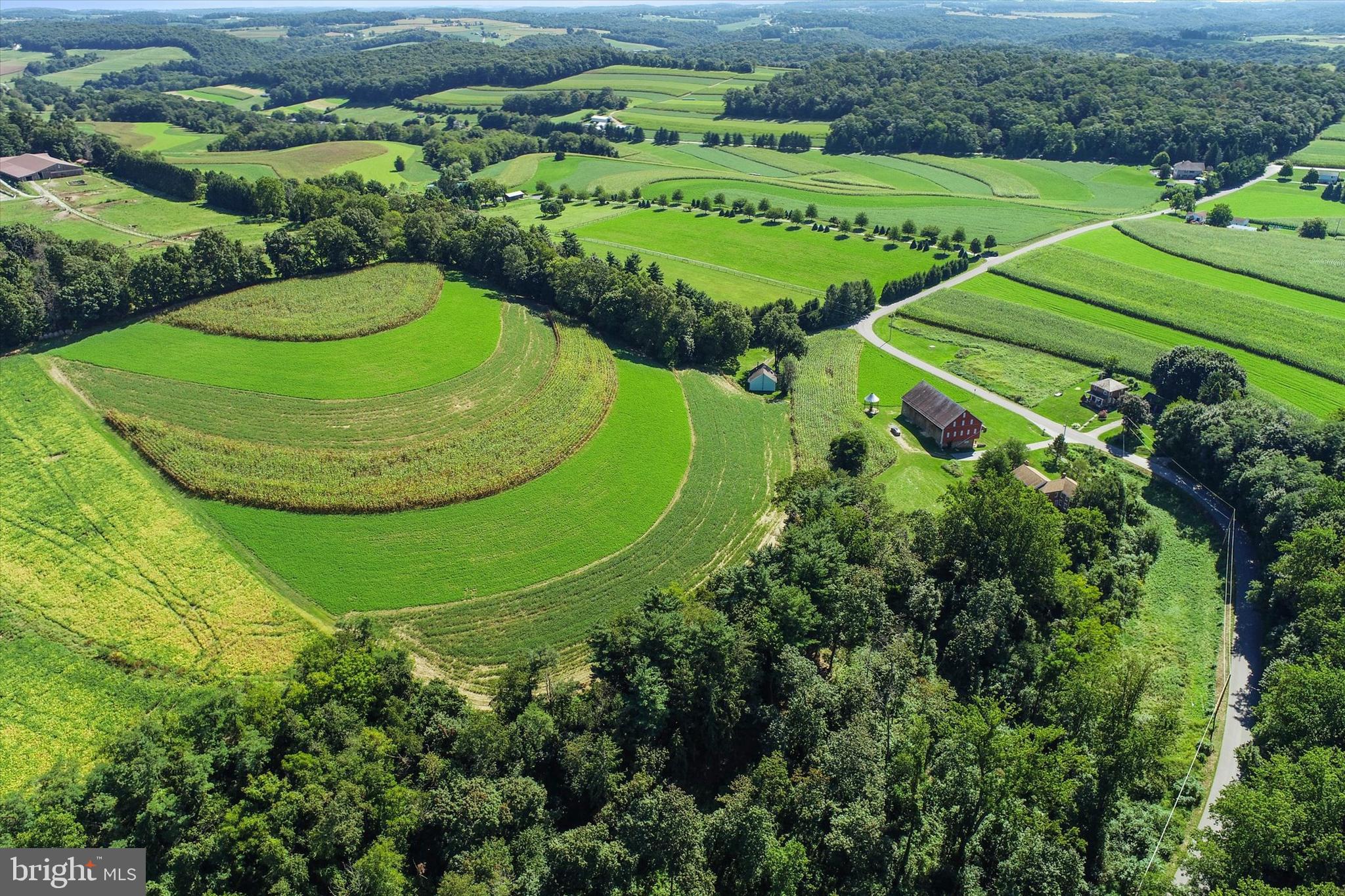 8219 Lehman Road Dallastown, PA 17313 - Photo 37 of 40 an aerial view of a golf course with a garden