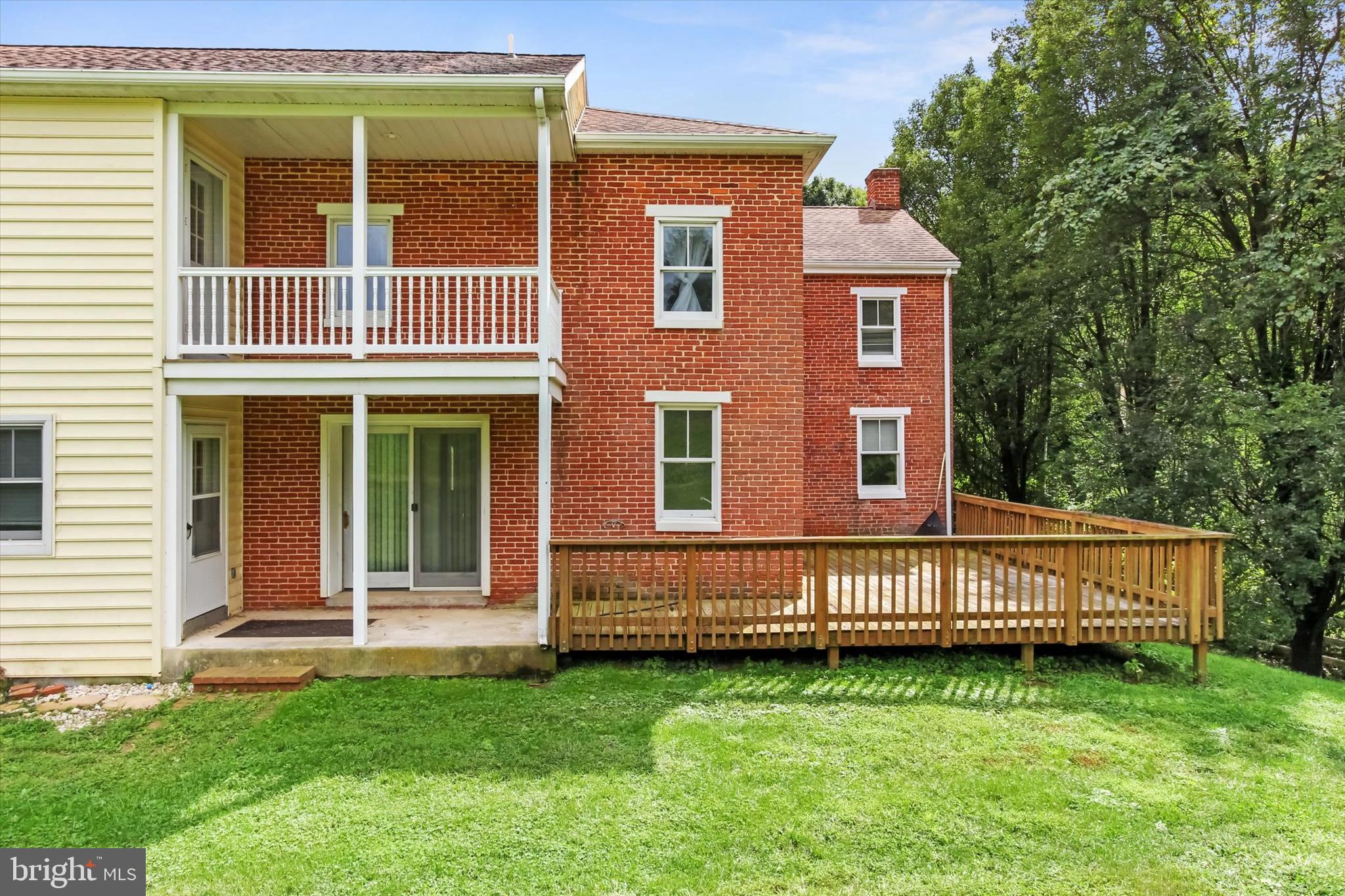 8219 Lehman Road Dallastown, PA 17313 - Photo 7 of 40 a view of a house with a wooden fence