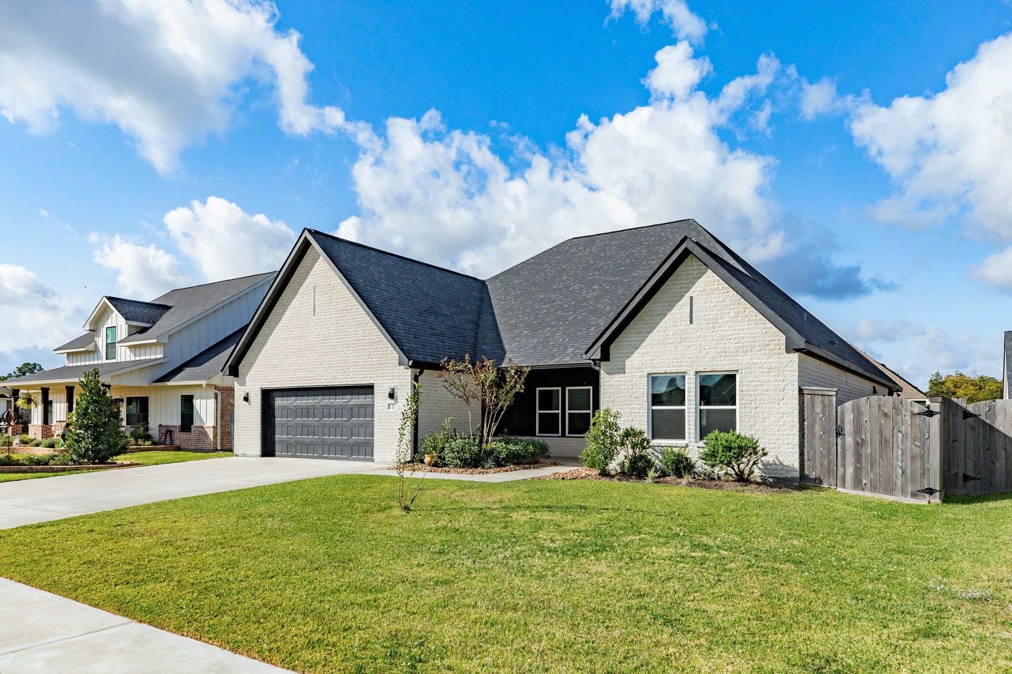 2 Greystone Court Angleton, TX 77515 - Photo 6 of 34 a view of a house with backyard