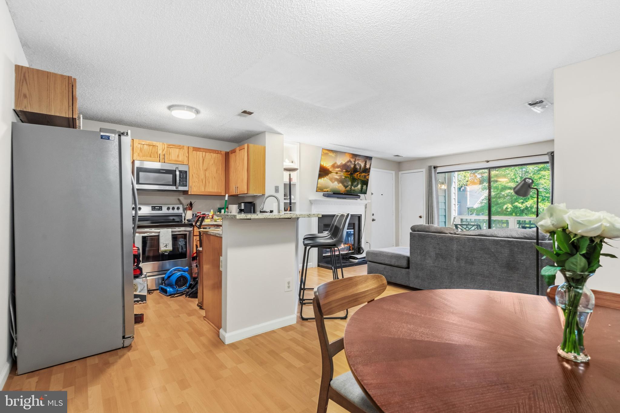 11705 Summerchase Circle Reston, VA 20194 - Photo 14 of 25 View from Dining Room into Kitchen & Living Room