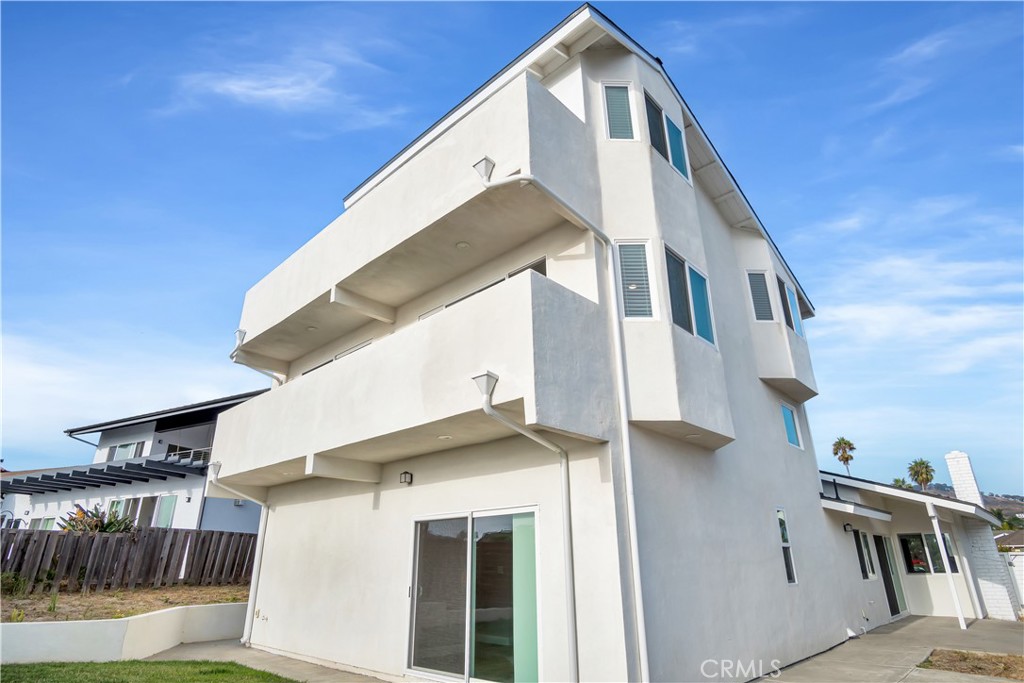 34511 Calle Monte Dana Point, CA 92624 - Photo 23 of 57 a front view of a house with a yard