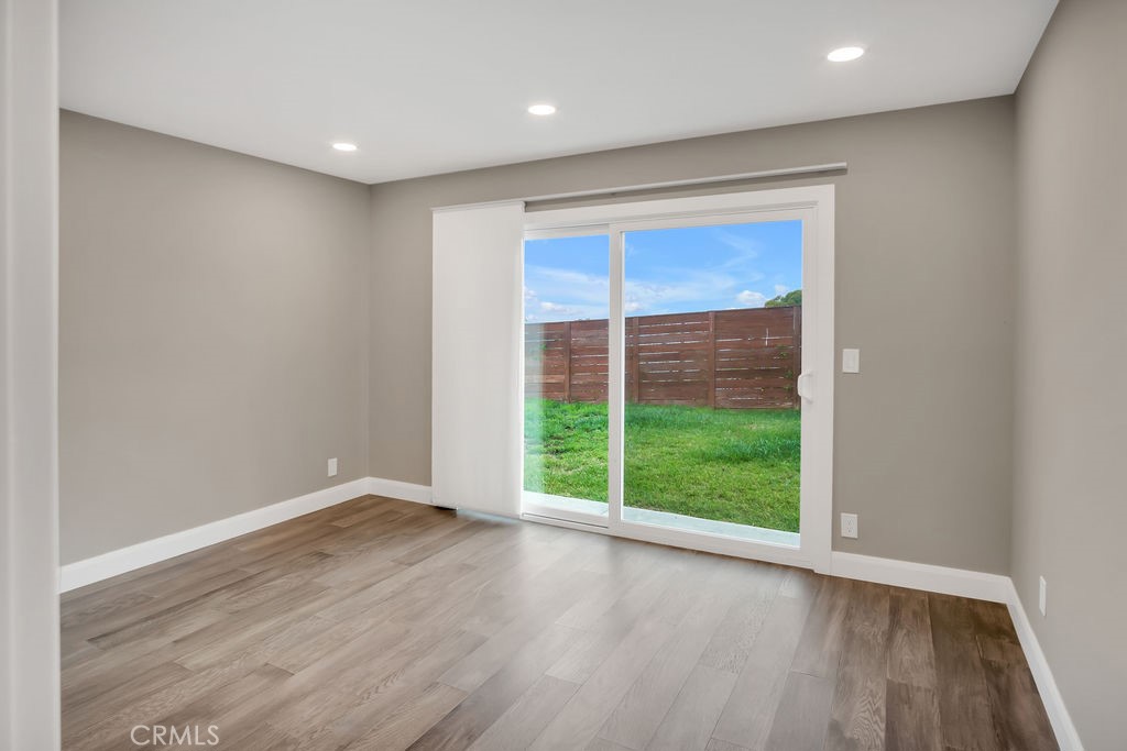 34511 Calle Monte Dana Point, CA 92624 - Photo 39 of 57 a view of an empty room with wooden floor and window