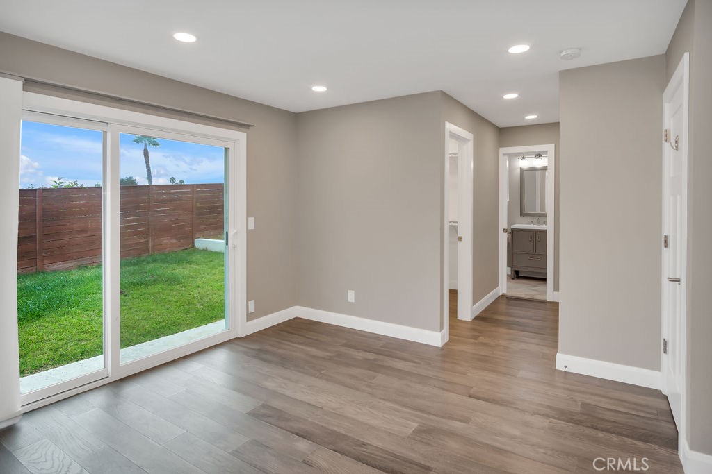 34511 Calle Monte Dana Point, CA 92624 - Photo 40 of 57 a view of hallway with a large window and wooden floor