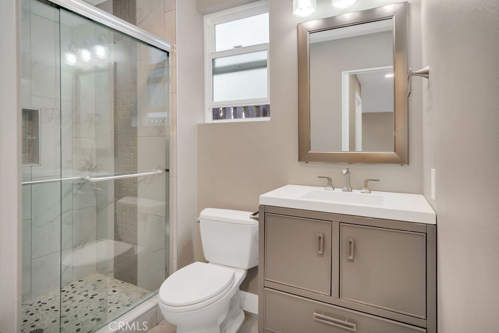 34511 Calle Monte Dana Point, CA 92624 - Photo 43 of 57 a bathroom with a sink toilet and shower