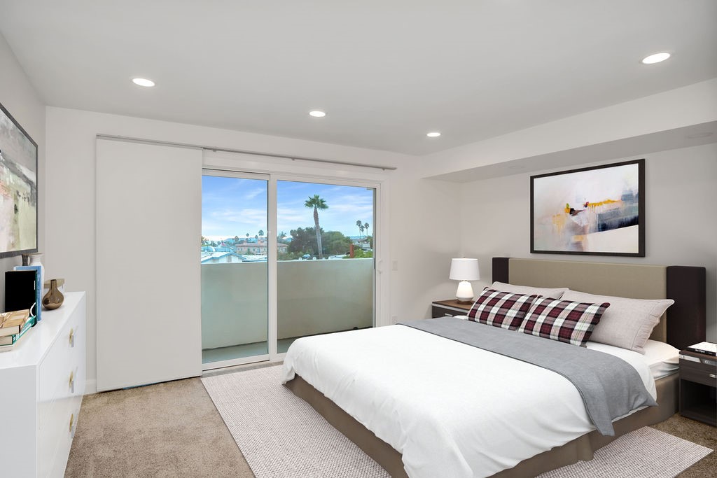 34511 Calle Monte Dana Point, CA 92624 - Photo 48 of 57 a bedroom with a large bed and a painting on the wall