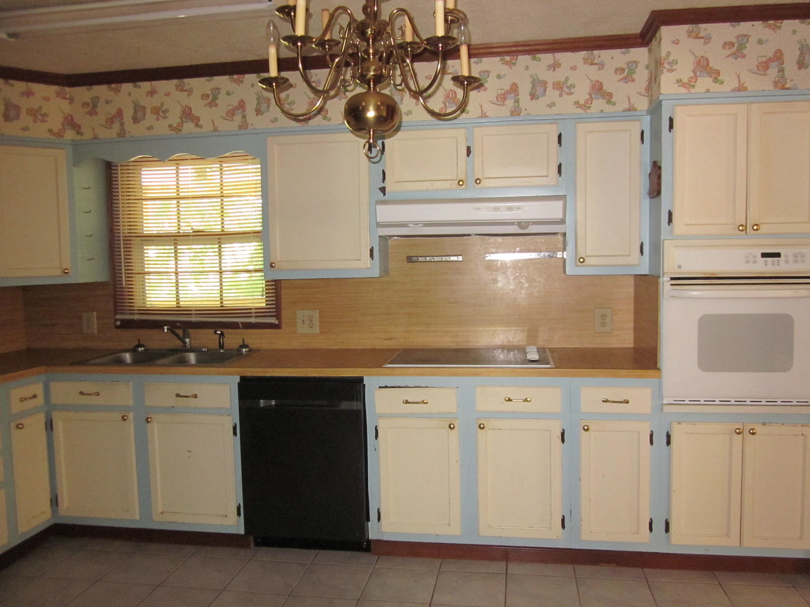 2744 Hopkins Road Rocky Mount, VA 24151 - Photo 22 of 45 a kitchen with white cabinets and sink