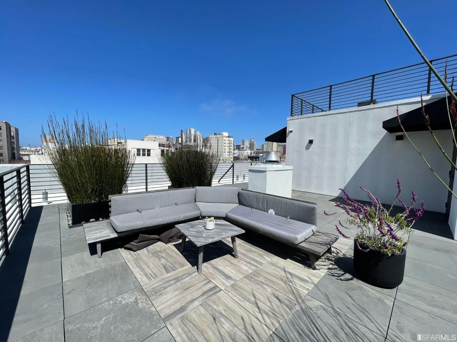 Larkin Street San Francisco, CA 94109 - Photo 20 of 24 a view of a patio with couches and potted plants
