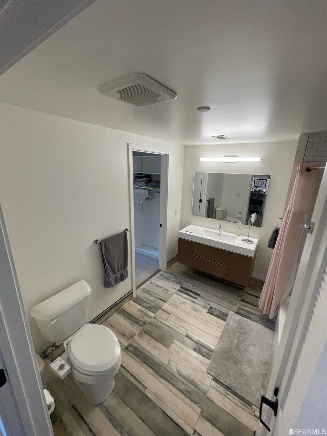 Larkin Street San Francisco, CA 94109 - Photo 10 of 24 a bathroom with a toilet sink and a bathtub