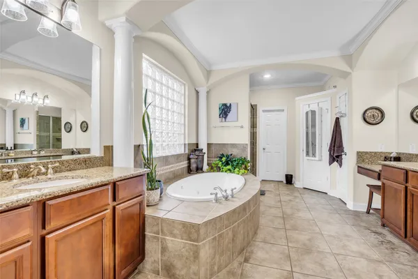 a very nice looking kitchen with a large window