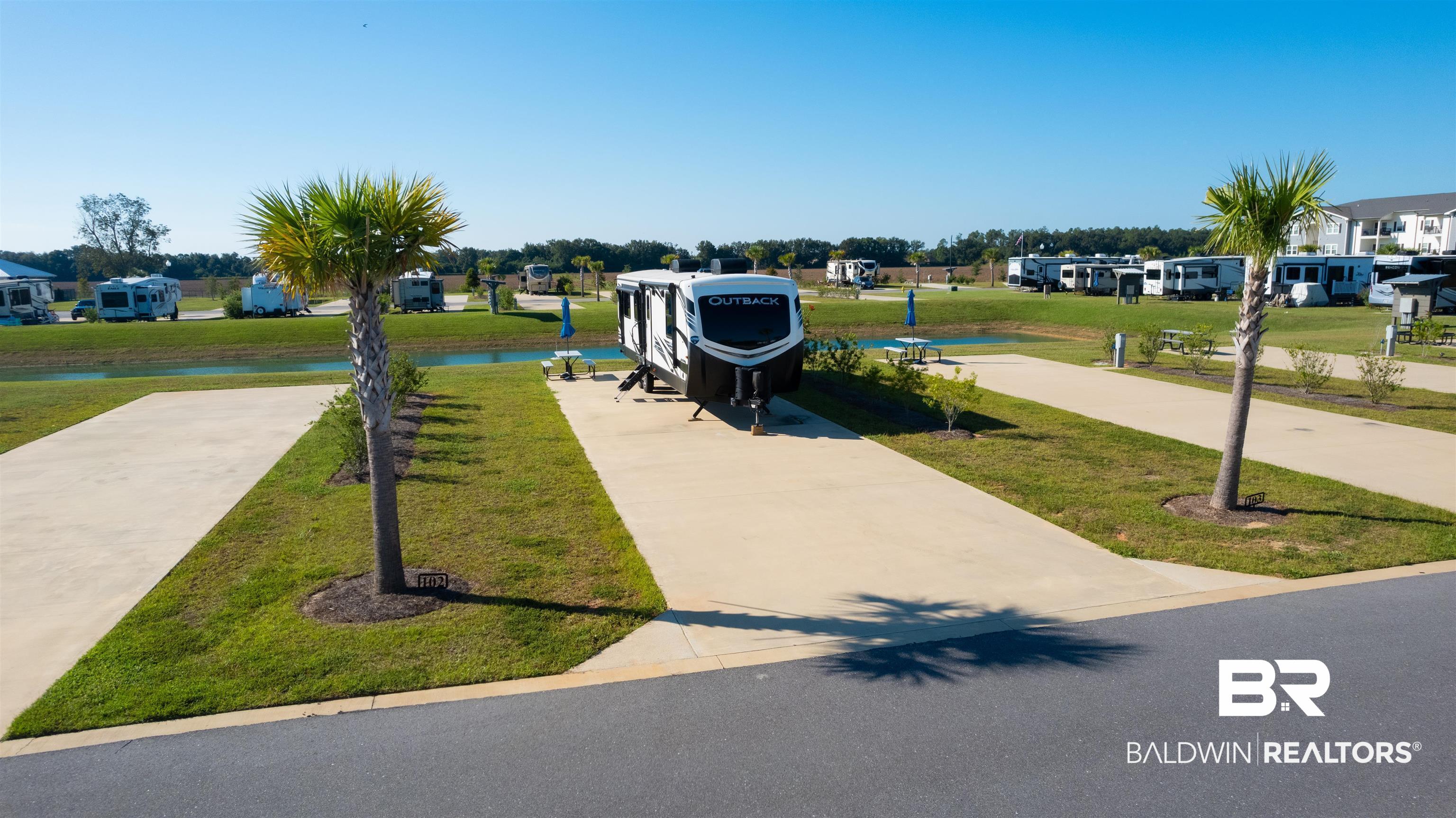 730 Vacation Circle Foley, AL 36535 - Photo 13 of 18 View of community with a yard and a water view