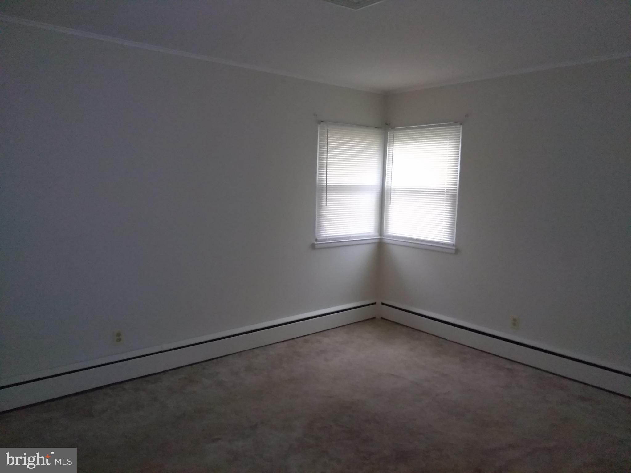 1176 Lower Ferry Road Ewing, NJ 08618 - Photo 22 of 30 an empty room with a window