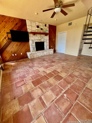 a view of a livingroom with a fireplace