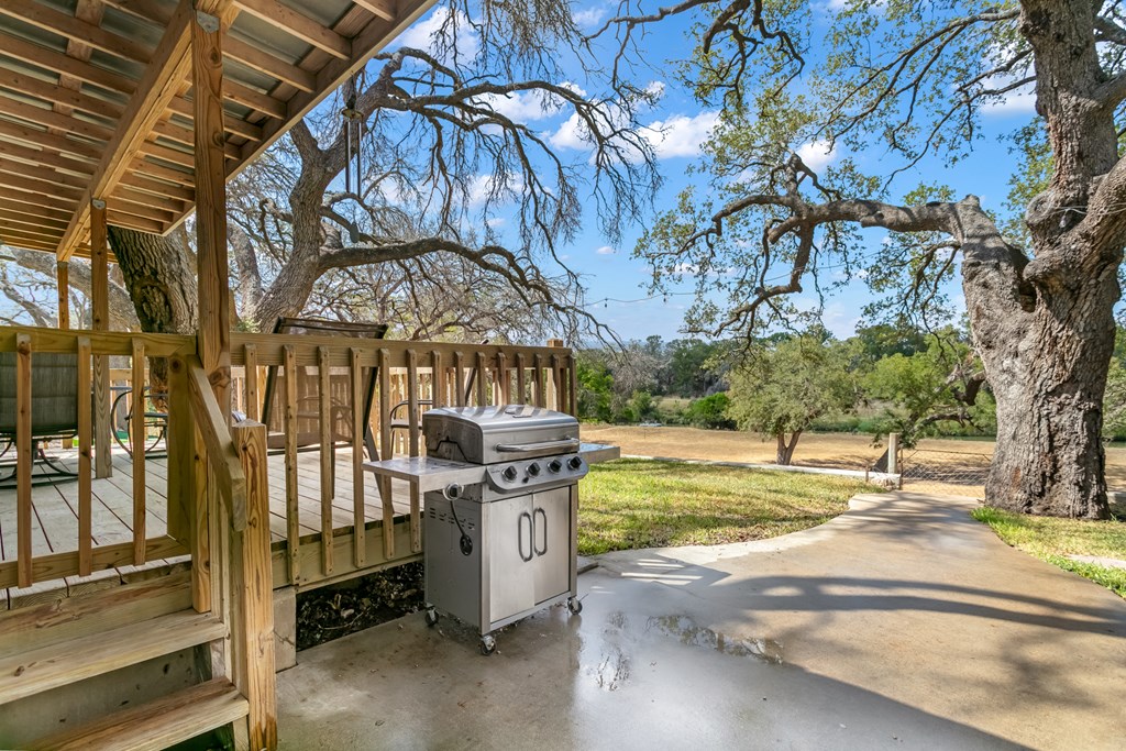 229 Ranch Road 1 Stonewall, TX 78671 - Photo 17 of 25 a view of an house with backyard space and balcony