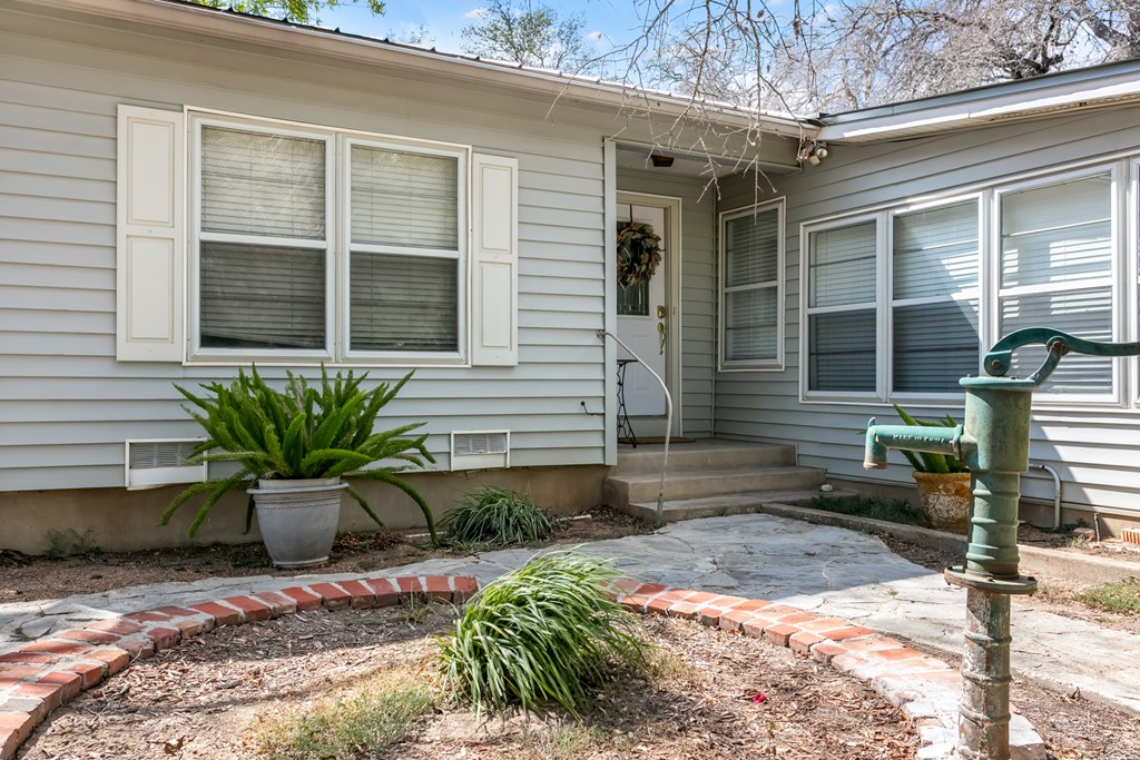 229 Ranch Road 1 Stonewall, TX 78671 - Photo 23 of 25 a front view of a house with outdoor space
