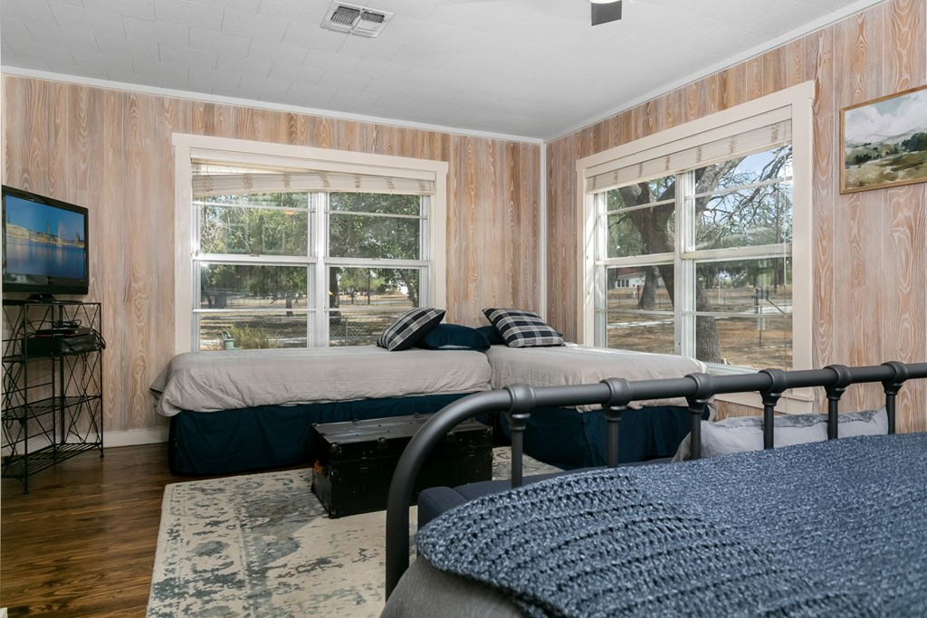 229 Ranch Road 1 Stonewall, TX 78671 - Photo 10 of 25 a living room with a large window and a table