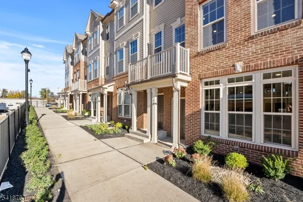 a view of a building next to a blue building