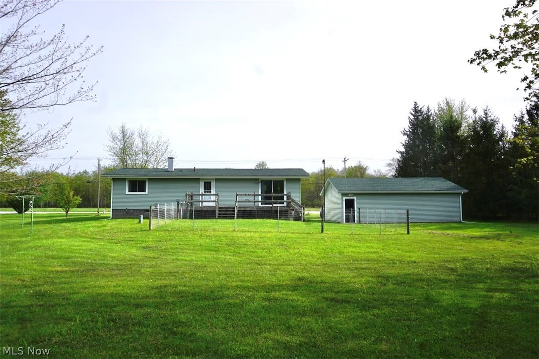5875 Trumbull Road Geneva, OH 44041 - Photo 21 of 33 Rear view of the home & garage.
