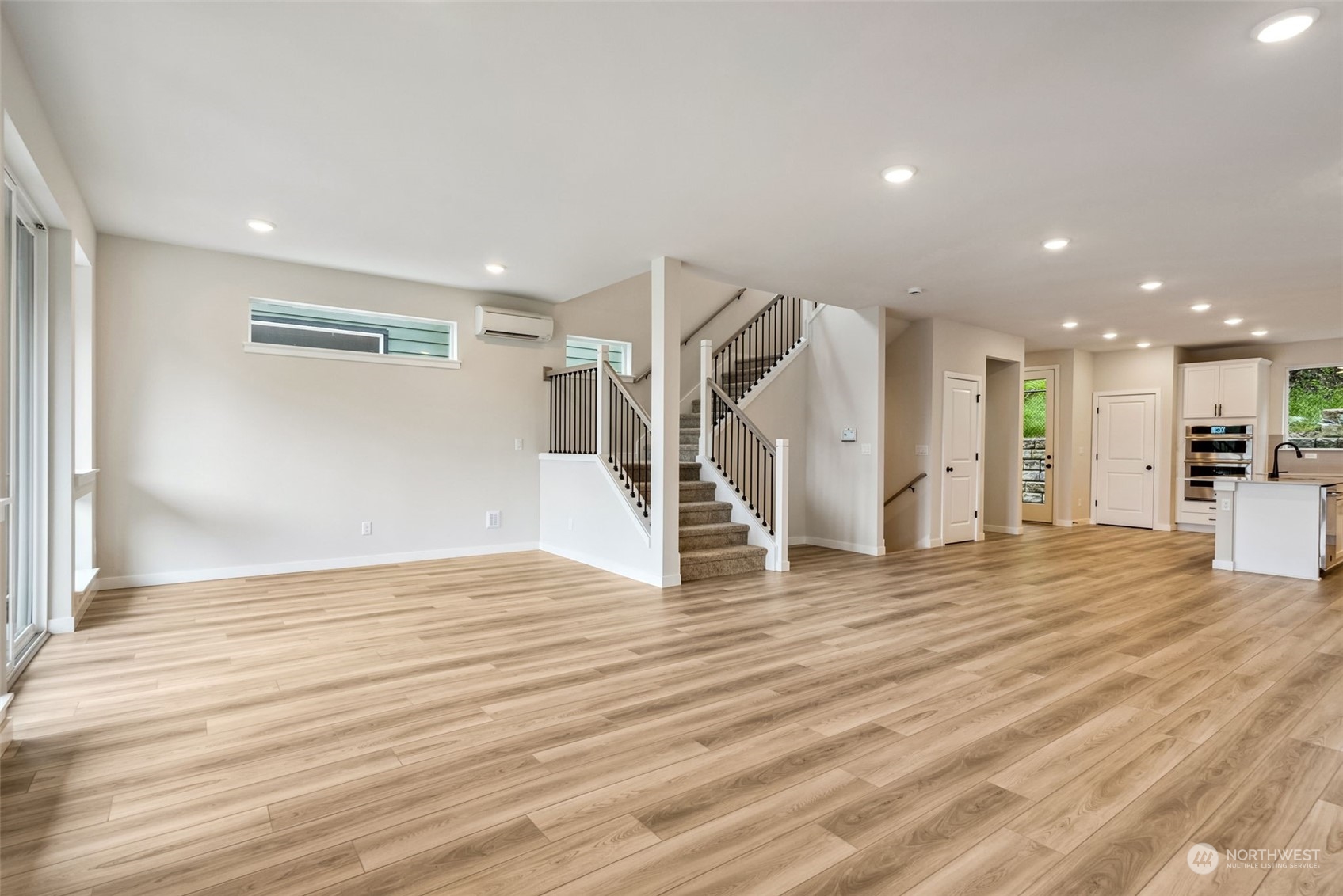 4010 Aberdeen Place Northeast, Unit 31 Renton, WA 98056 - Photo 11 of 35 a view of empty room with wooden floor