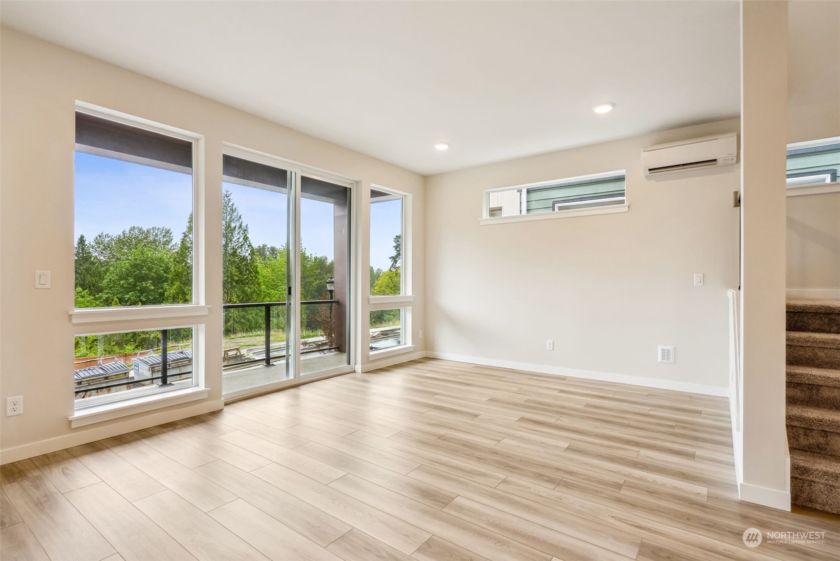 4010 Aberdeen Place Northeast, Unit 31 Renton, WA 98056 - Photo 12 of 35 a view of livingroom with hardwood floor and window