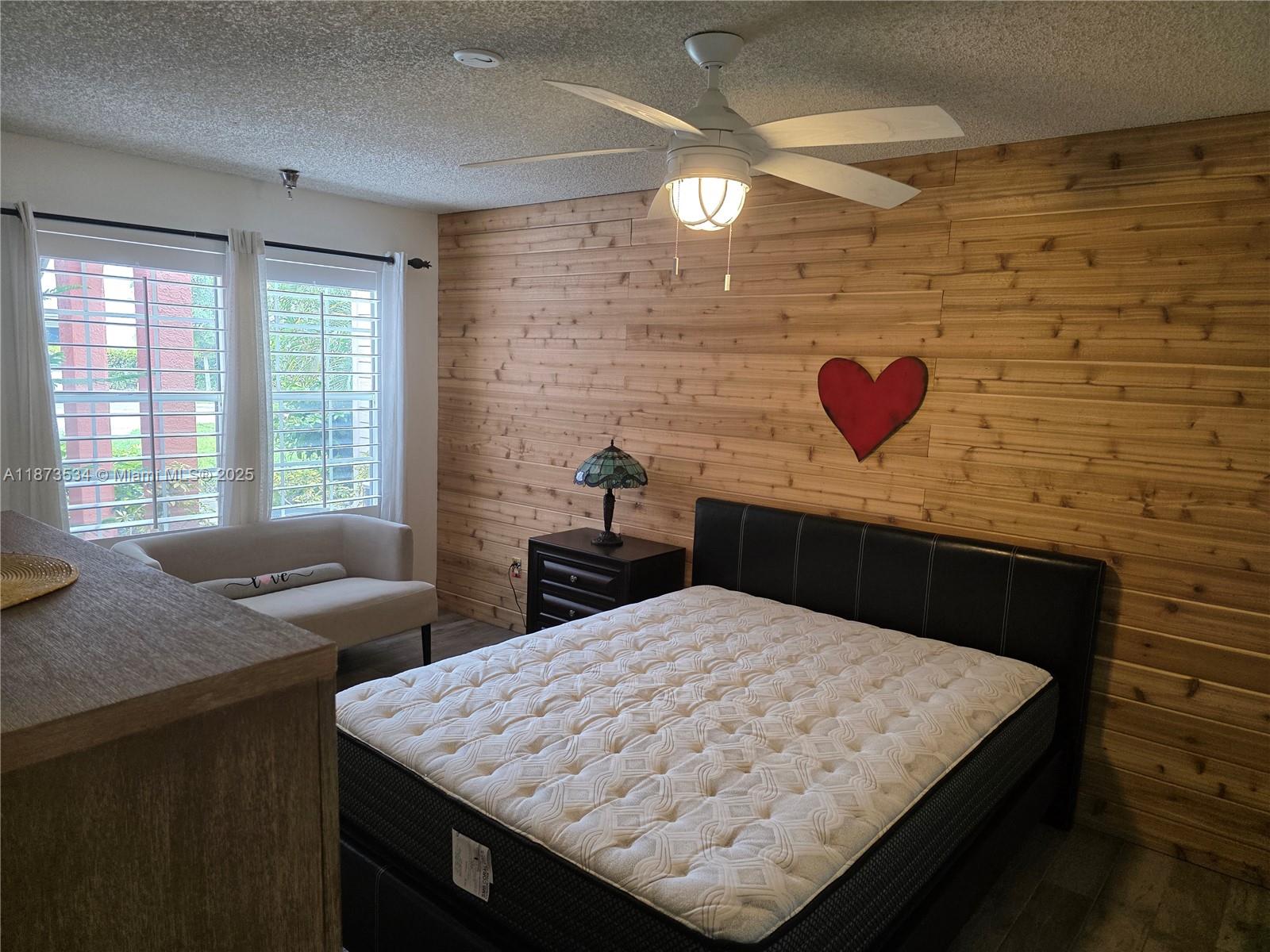 1365 Crystal Way, Unit G Delray Beach, FL 33444 - Photo 19 of 30 a room with a table and chairs