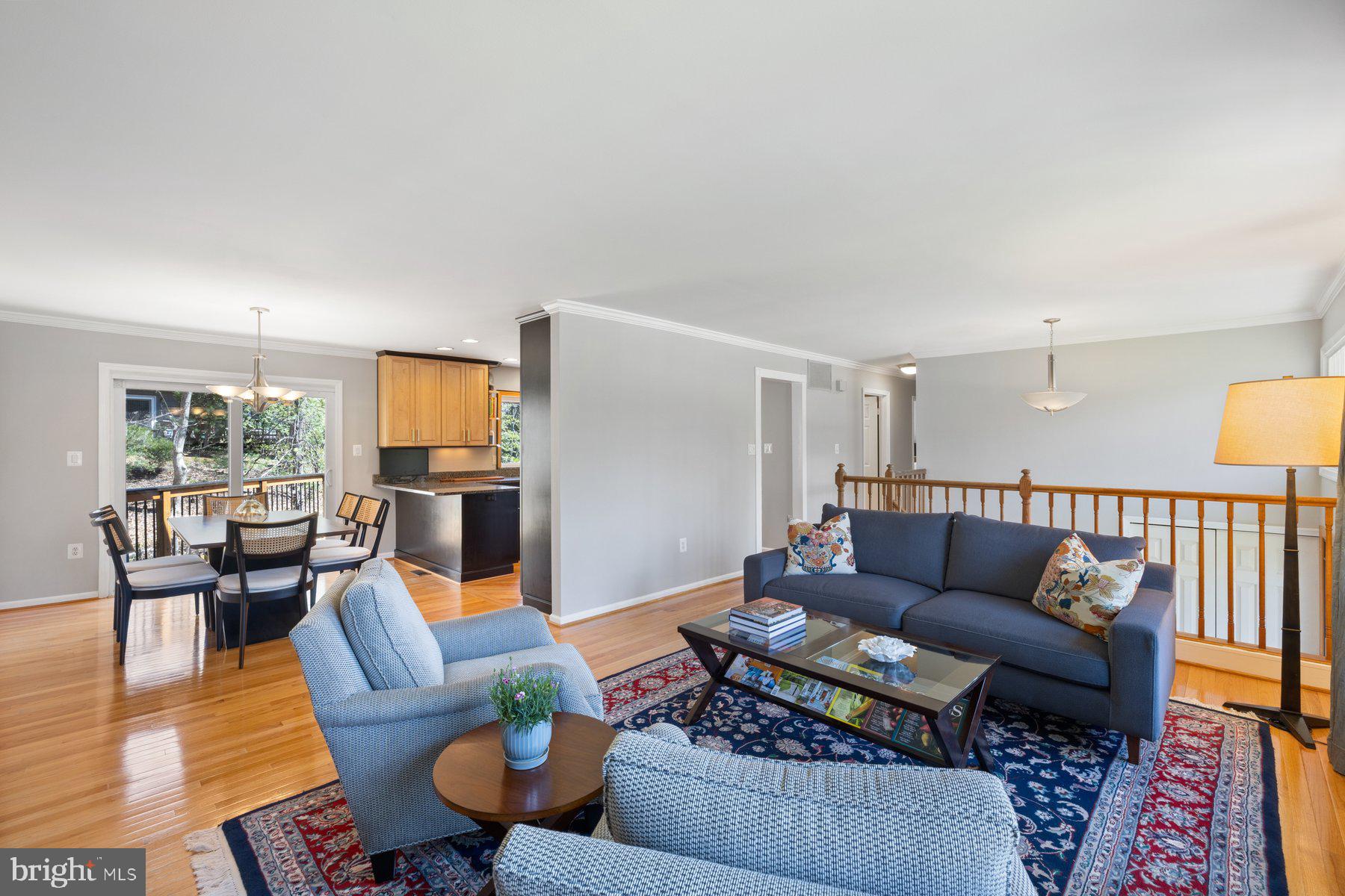9008 Arley Drive Springfield, VA 22153 - Photo 13 of 40 a living room with furniture fireplace and a table