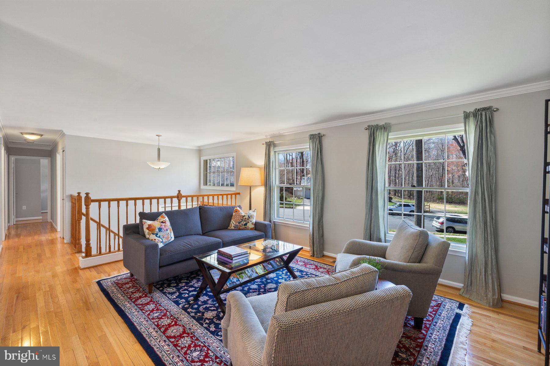 9008 Arley Drive Springfield, VA 22153 - Photo 14 of 40 a living room with furniture and a table