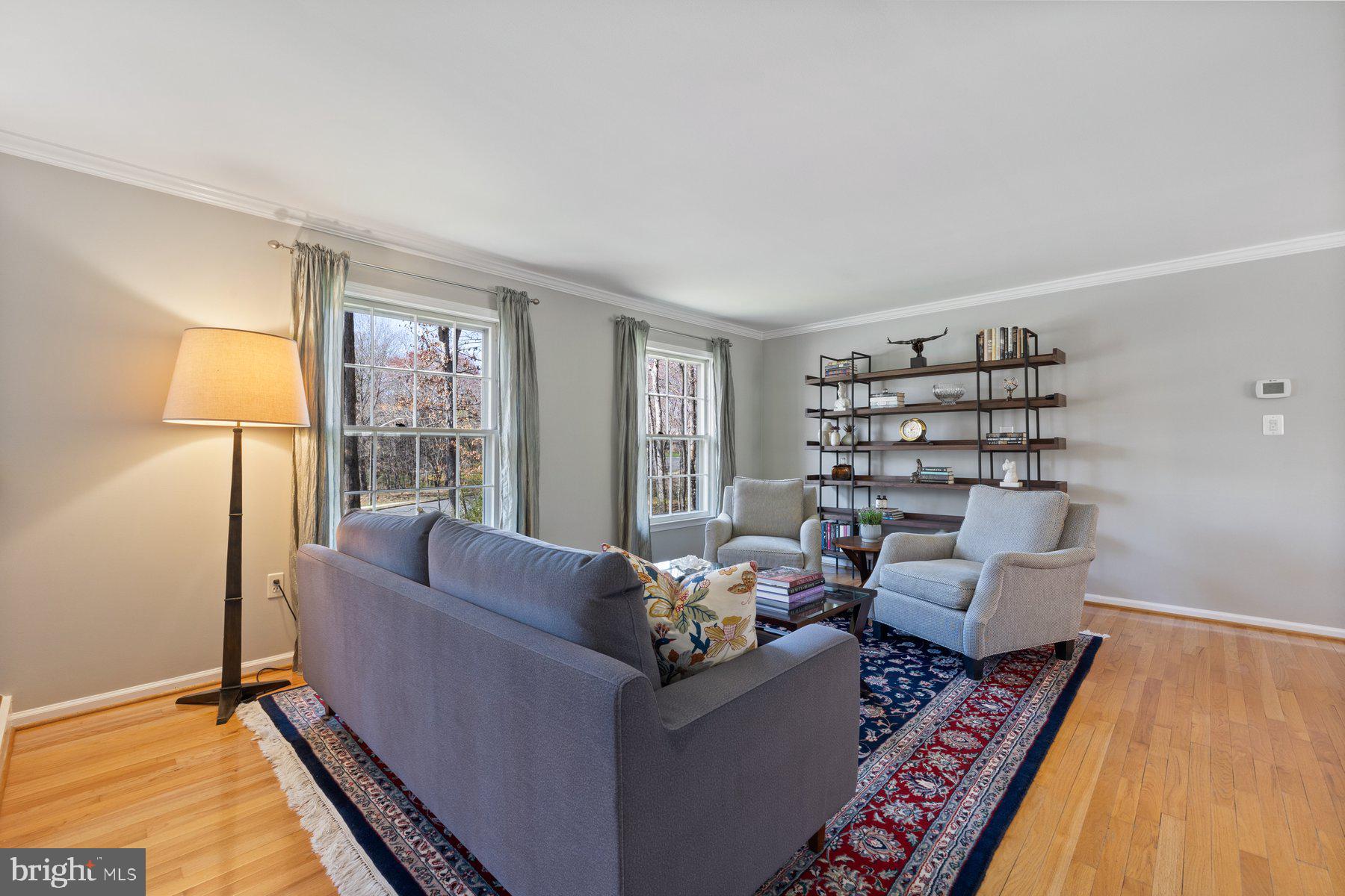 9008 Arley Drive Springfield, VA 22153 - Photo 15 of 40 a living room with furniture and a wooden floor