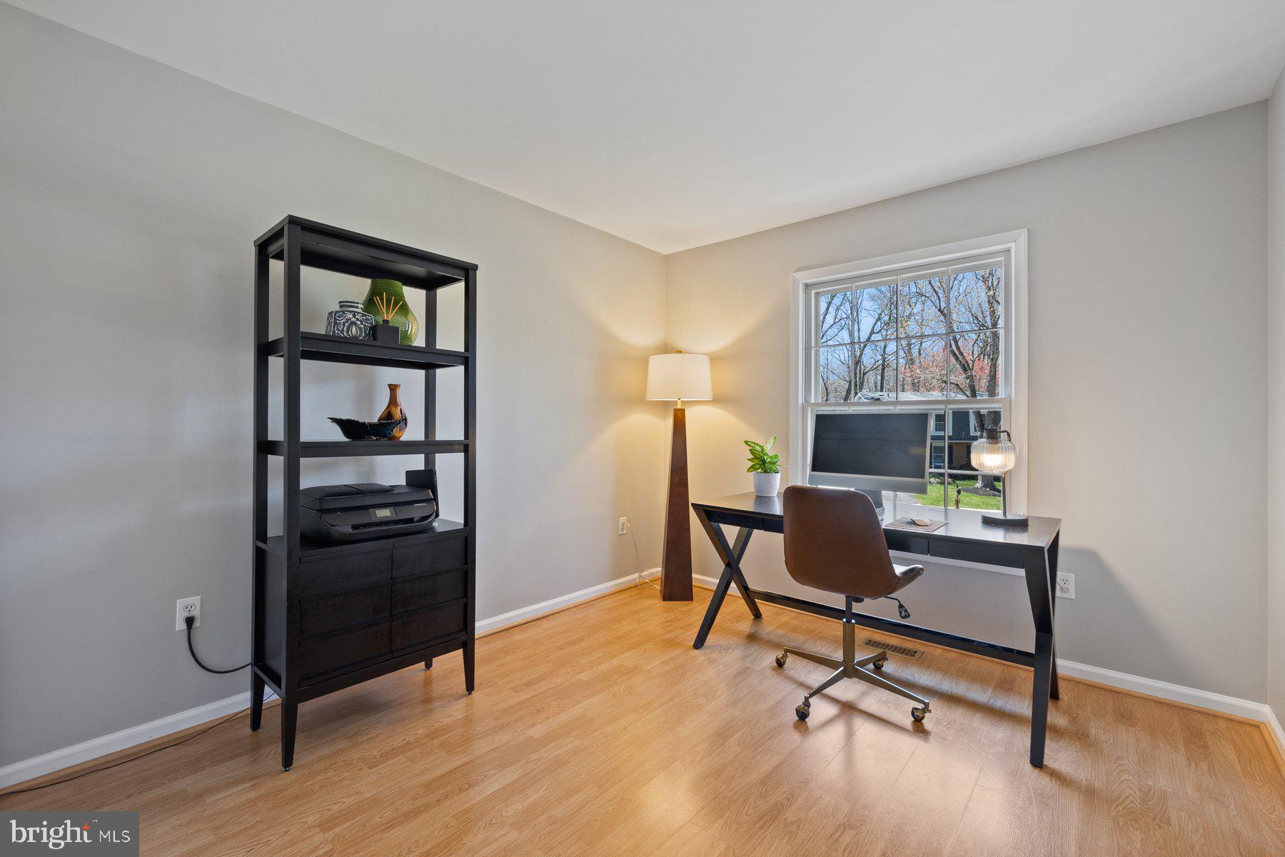 9008 Arley Drive Springfield, VA 22153 - Photo 22 of 40 a view of a workspace with furniture and a window