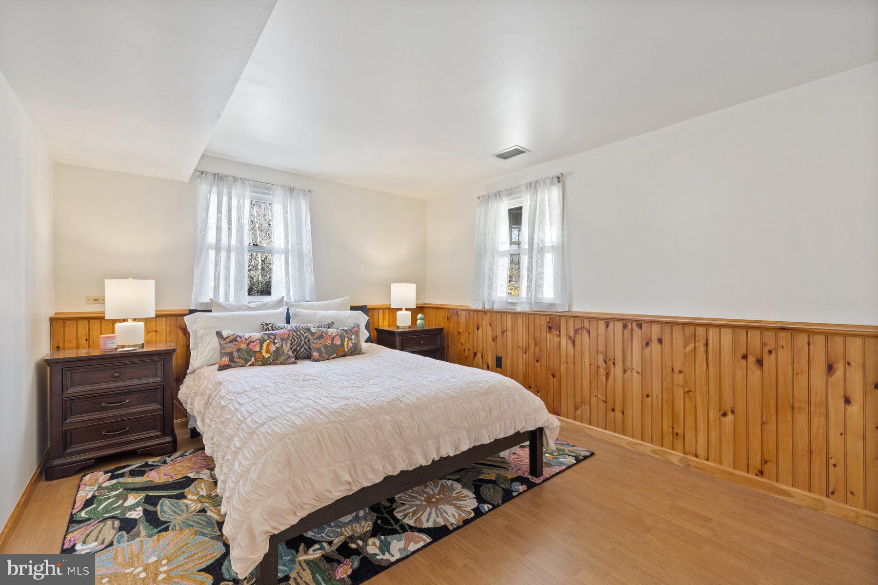 9008 Arley Drive Springfield, VA 22153 - Photo 28 of 40 a bedroom with a bed and a dresser