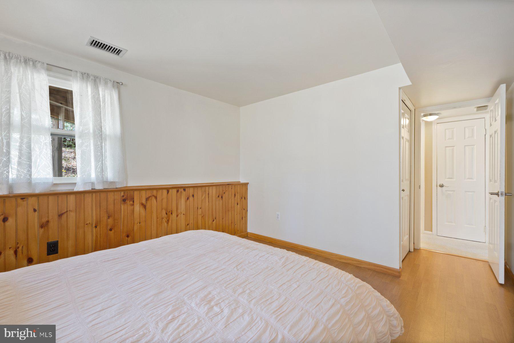 9008 Arley Drive Springfield, VA 22153 - Photo 29 of 40 a bedroom with a bed and a window