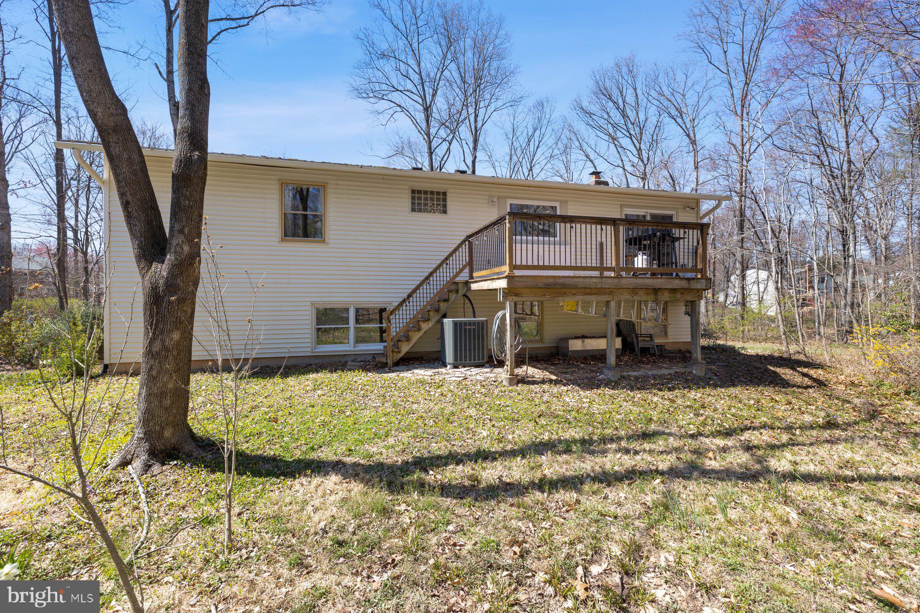 9008 Arley Drive Springfield, VA 22153 - Photo 3 of 40 a view of a house with a yard