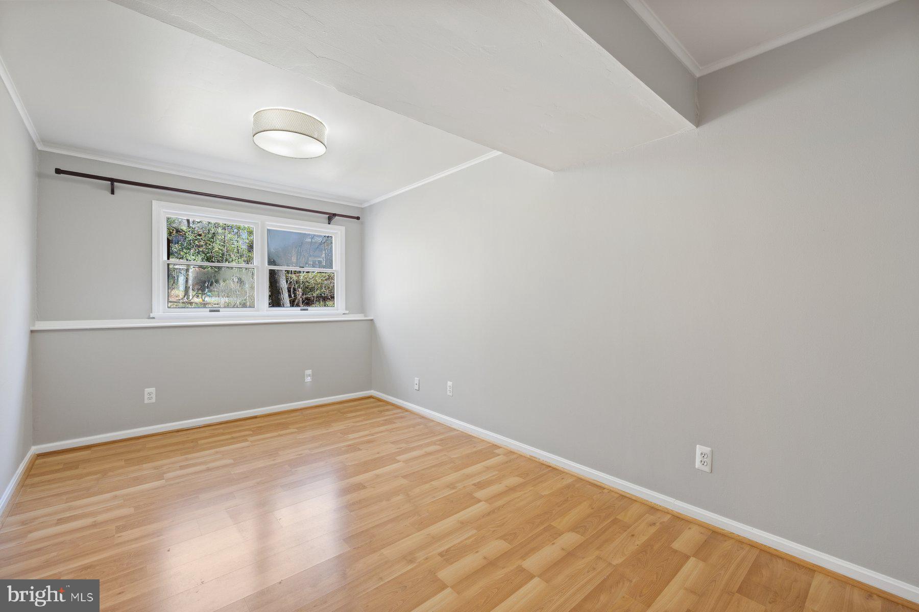 9008 Arley Drive Springfield, VA 22153 - Photo 32 of 40 an empty room with windows