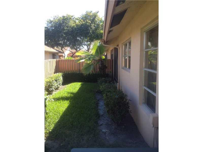 8190 Springtree Road, Unit A Boca Raton, FL 33496 - Photo 2 of 6 Exterior Back Other