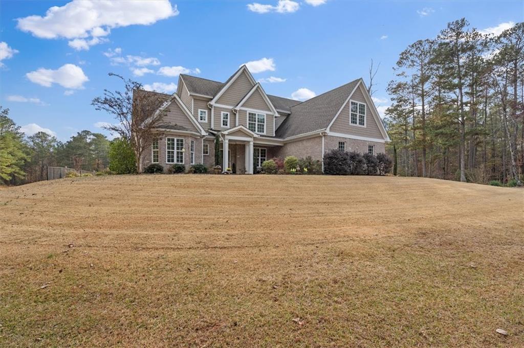 5320 North Helton Road Winston, GA 30187 - Photo 11 of 100 a front view of a house with a yard