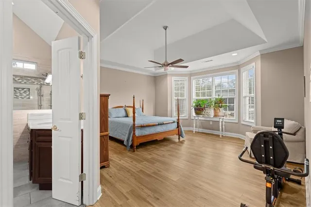 a living room with furniture and flat screen tv