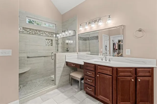 a view of house with outdoor space and sitting area