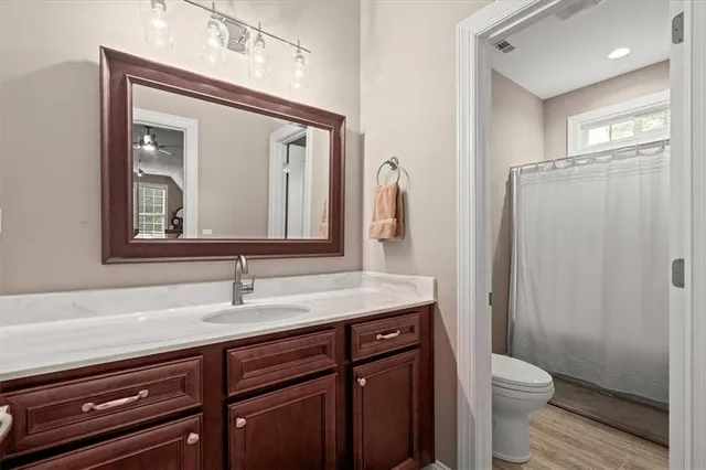 a view of a house with a yard and garage