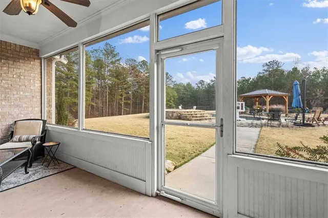 a kitchen with granite countertop stainless steel appliances a stove a sink and a refrigerator