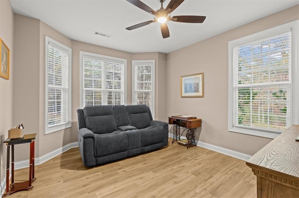 5320 North Helton Road Winston, GA 30187 - Photo 44 of 100 a bedroom with a bed and wooden floor