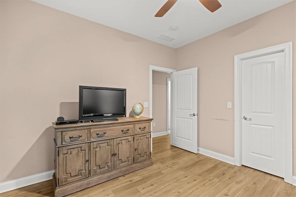 5320 North Helton Road Winston, GA 30187 - Photo 45 of 100 a living room with furniture and flat screen tv