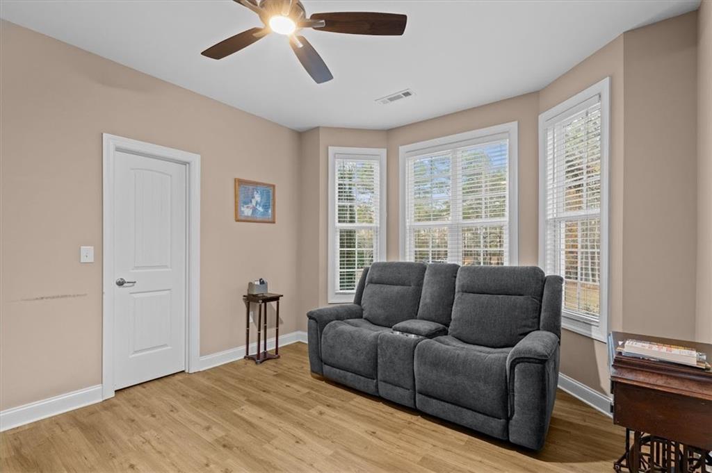 5320 North Helton Road Winston, GA 30187 - Photo 46 of 100 a living room with furniture and a large window
