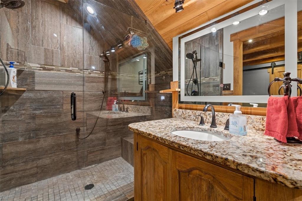 5320 North Helton Road Winston, GA 30187 - Photo 79 of 100 a bathroom with a sink and a mirror